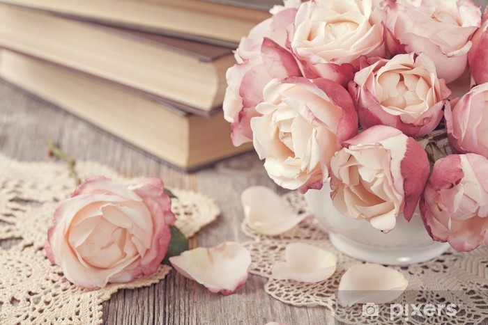 Pink roses and old books